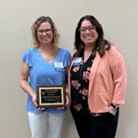 Lori is shown at left with Samantha Listwan, Regional&nbsp;Vice President Community Care Connections
